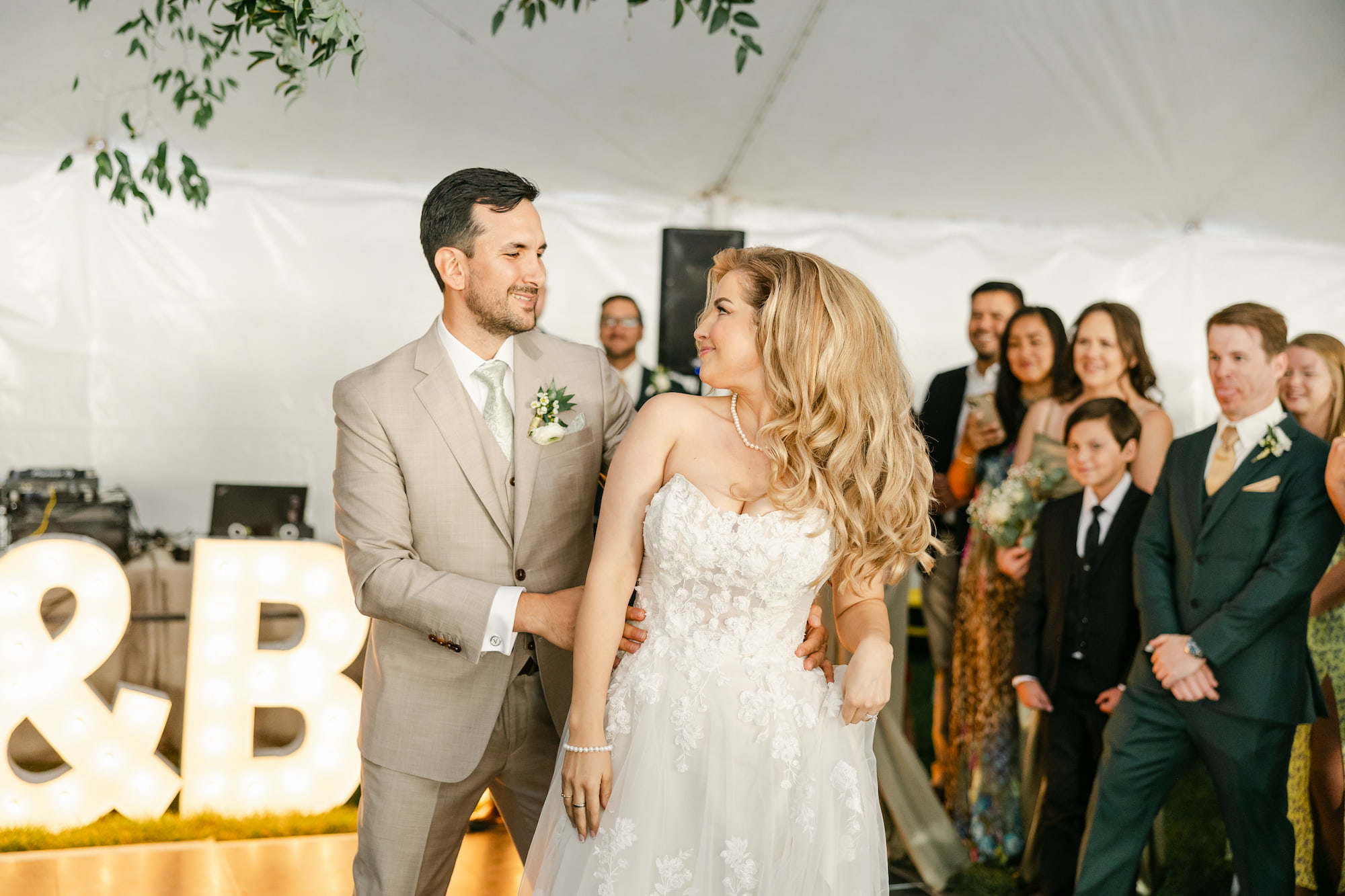 Wedding couple's first dance with DJ setup