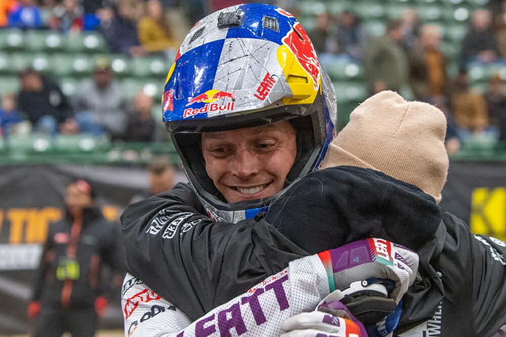 Jonny Walker hugging his team after clinching the title in Reno, photo from Cycle News