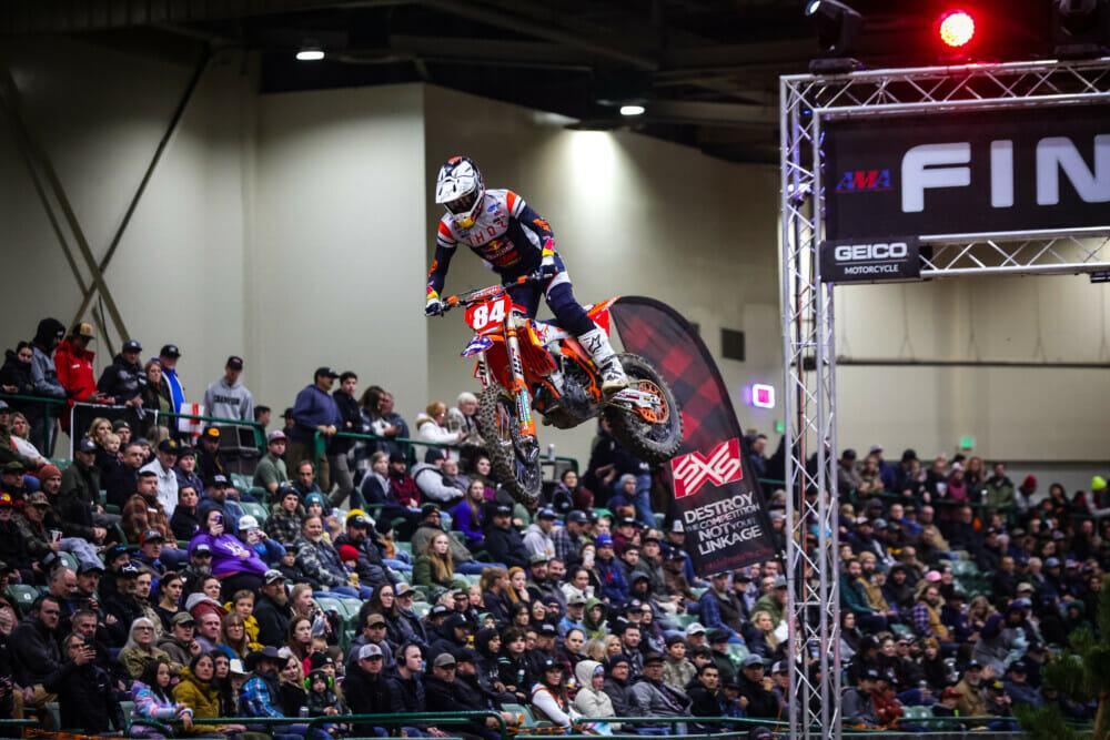 Trystan Hart in the air over the packed stands, photo by Jack Jaxson for Cycle News