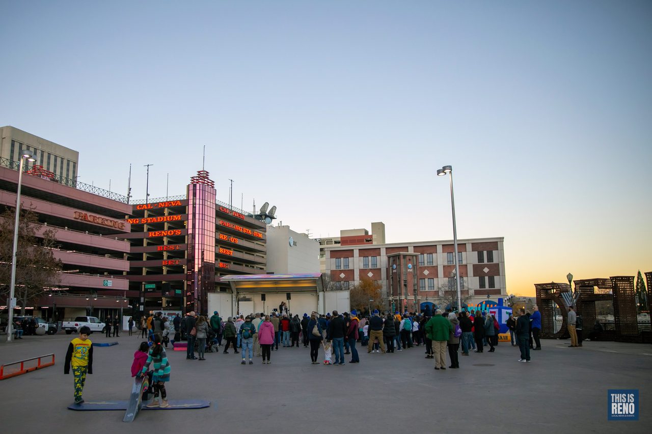 City Plaza at sunset as families arrive for the Menorah Lighting