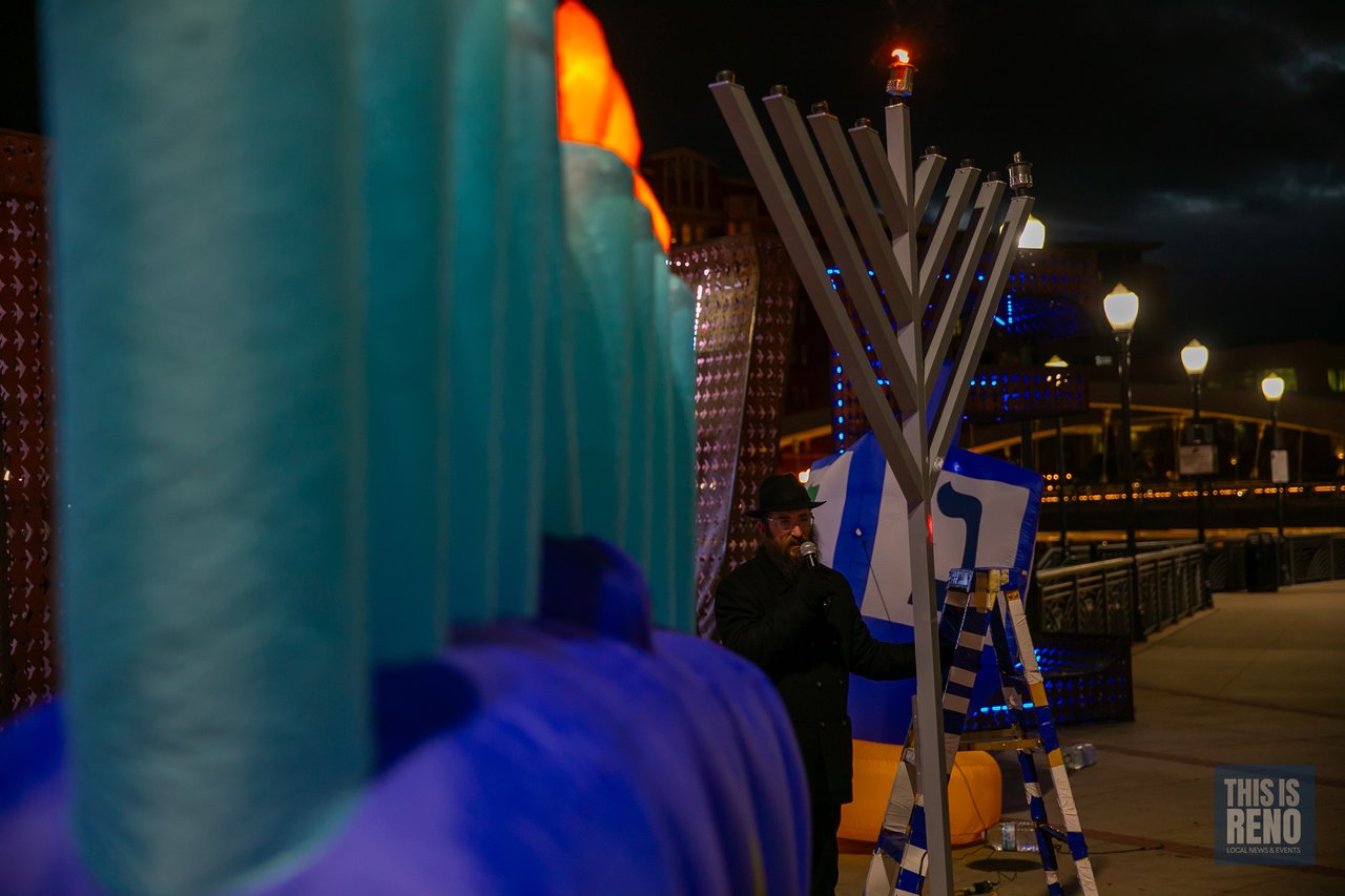 The ladder stands ready at the giant menorah