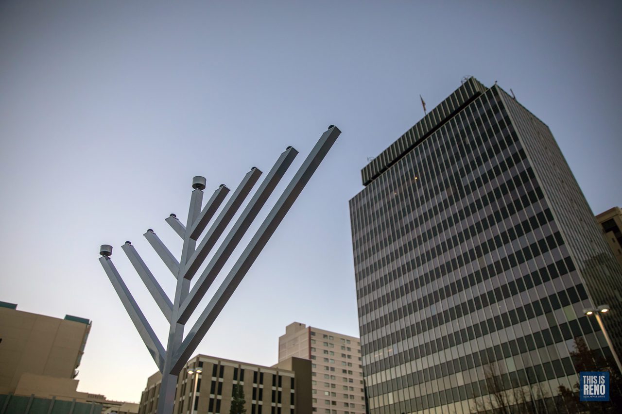 The City Plaza menorah against the downtown Reno towers before dark
