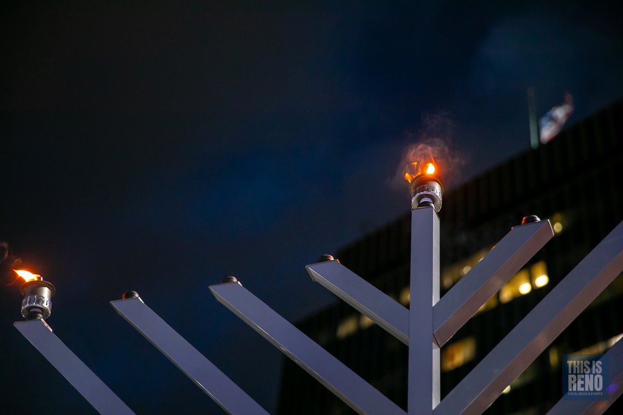 A flame on the giant menorah up close