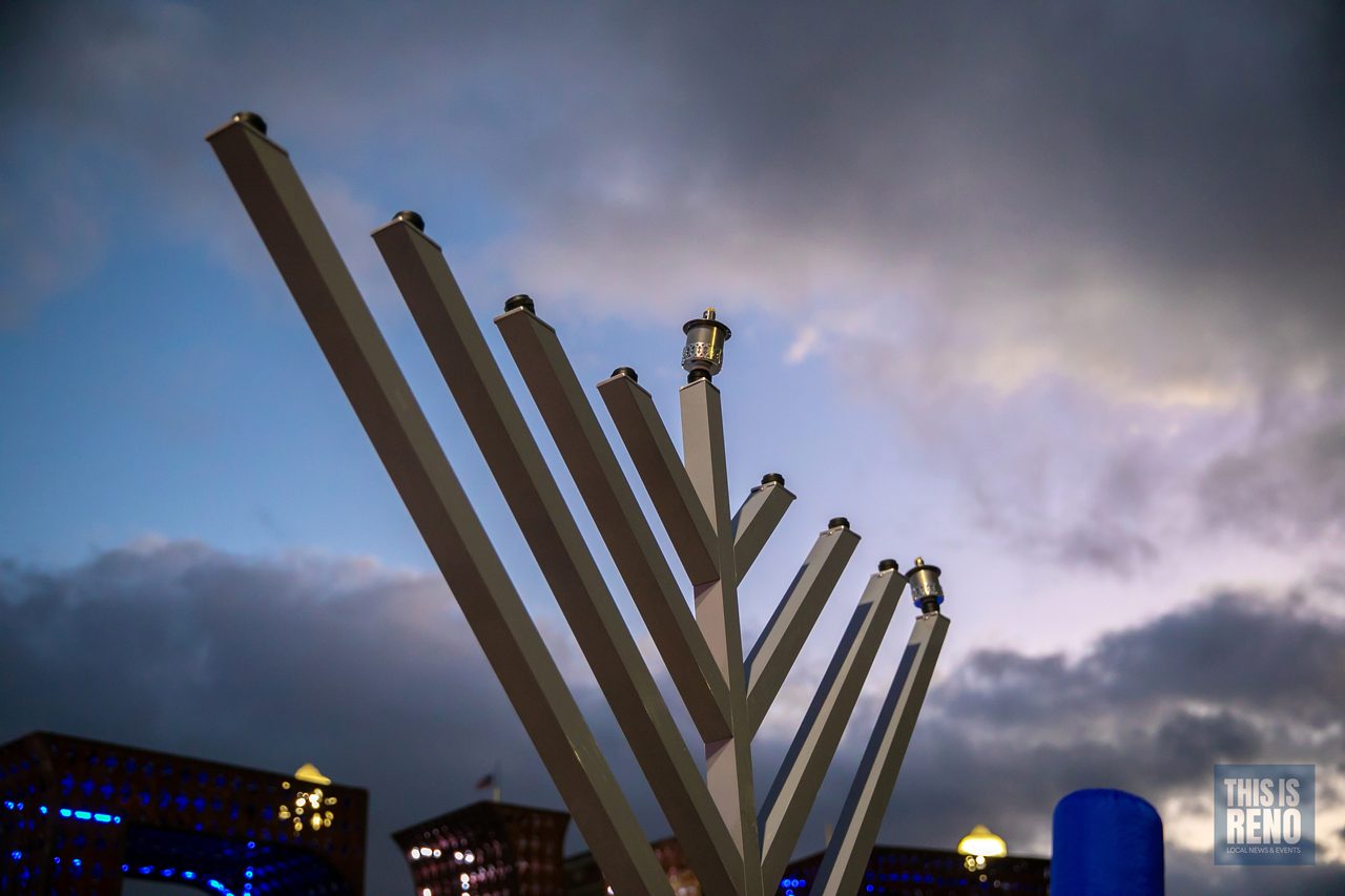 The menorah under evening clouds over City Plaza