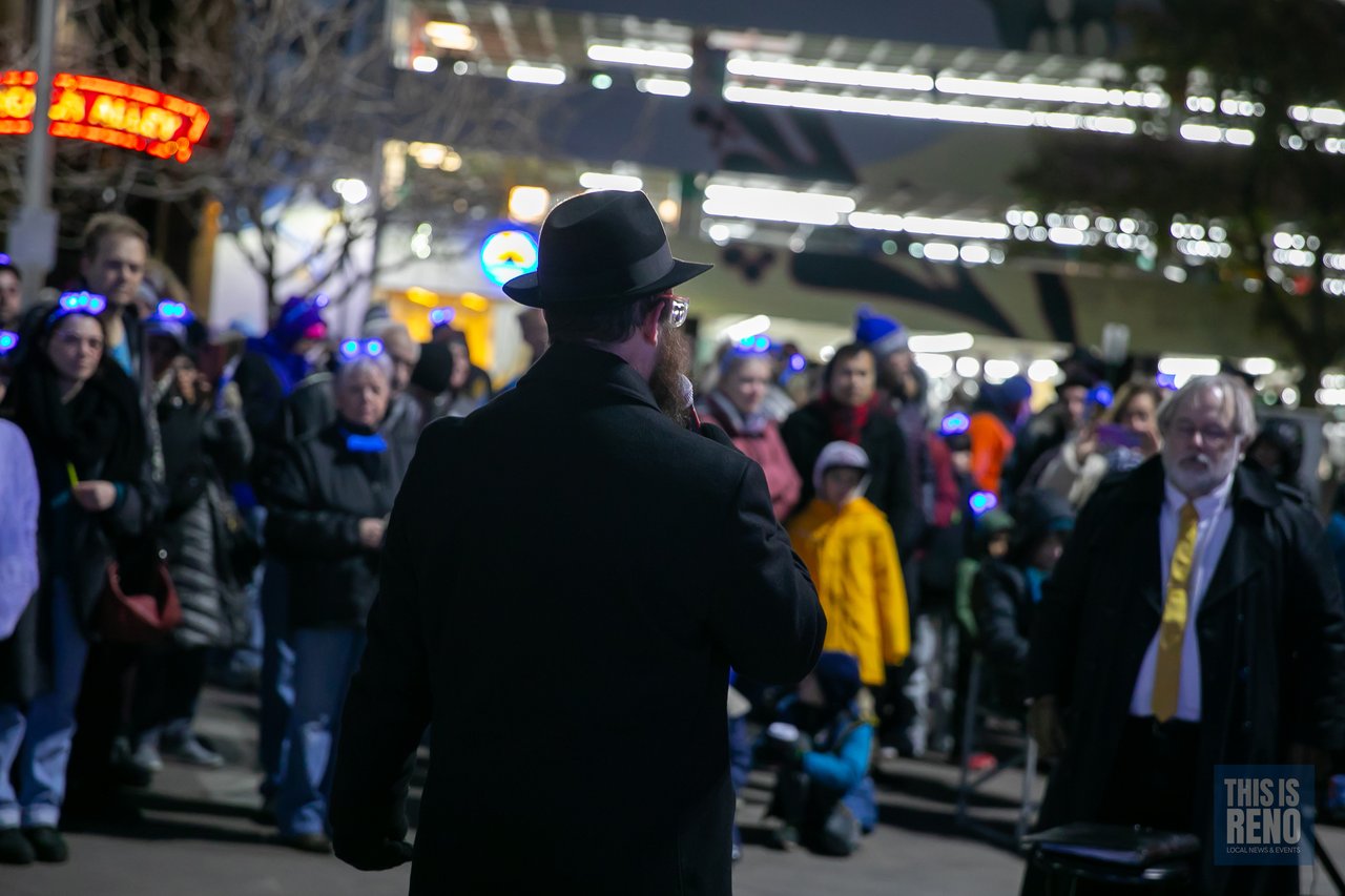A rabbi faces the crowd gathered in City Plaza