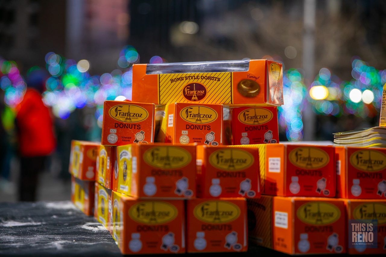 Boxes of holiday treats stacked for the crowd