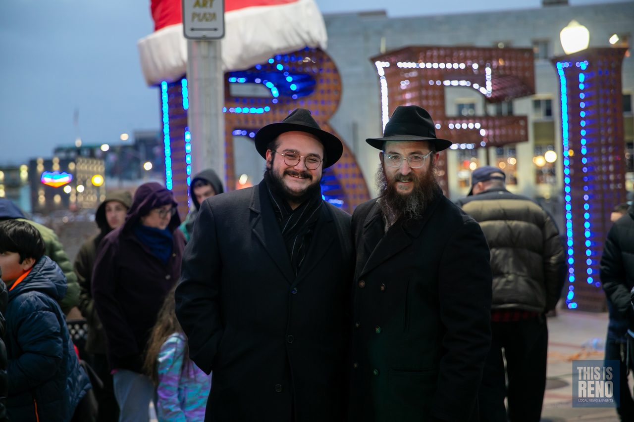 Two rabbis with families in the crowd