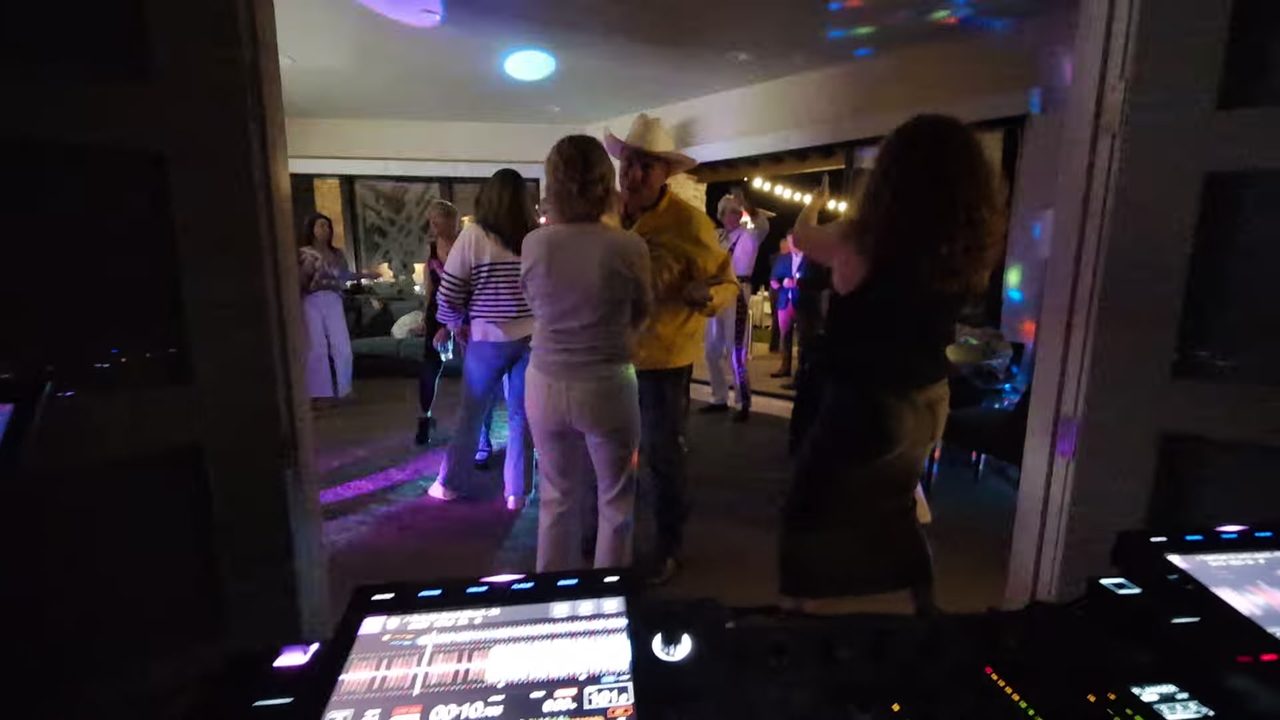The dance floor inside the house seen from behind the DJ booth