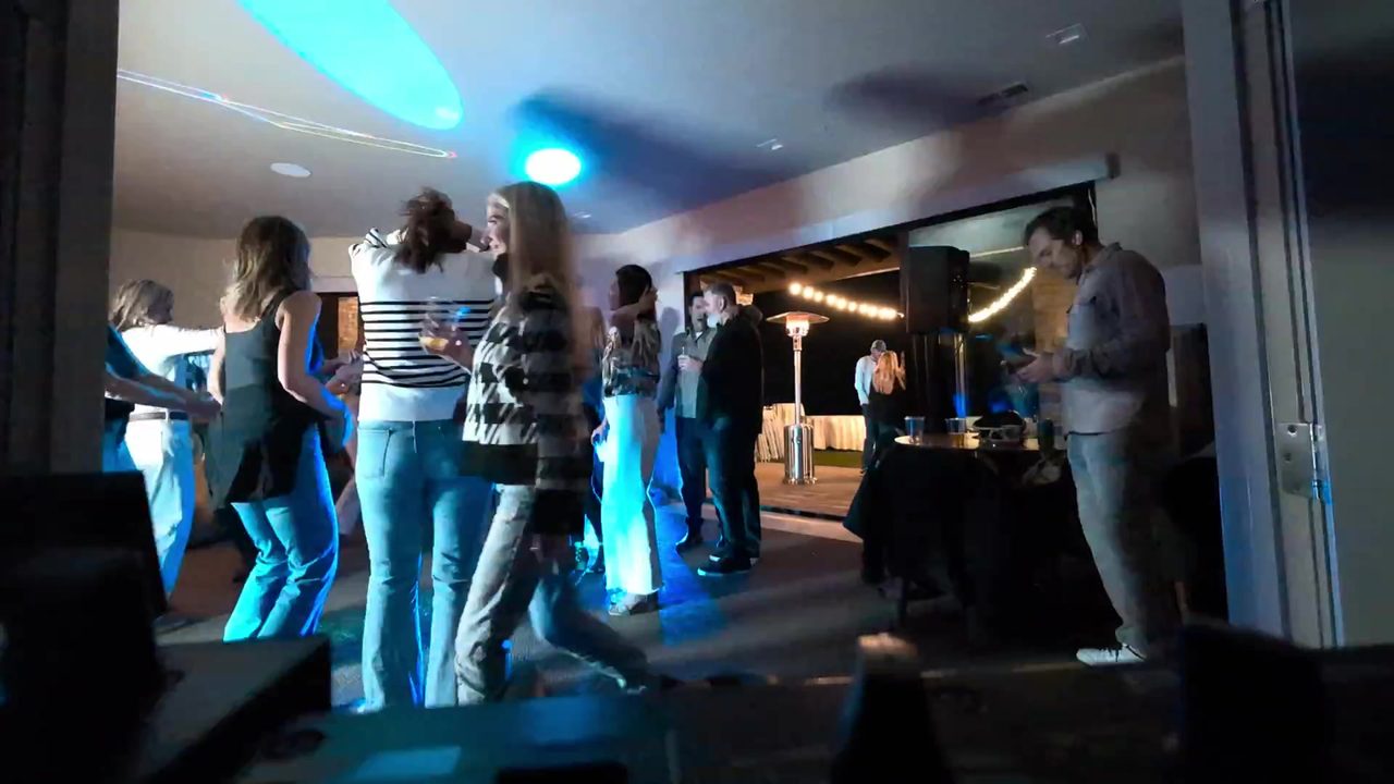 A full dance floor in the living room late in the night