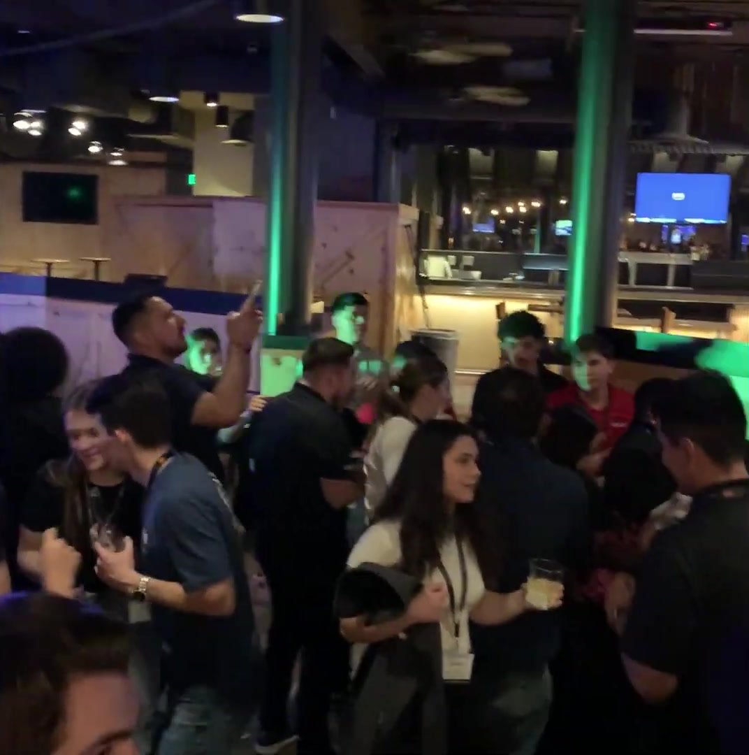 A packed dance floor at the PENTA Building Group mixer