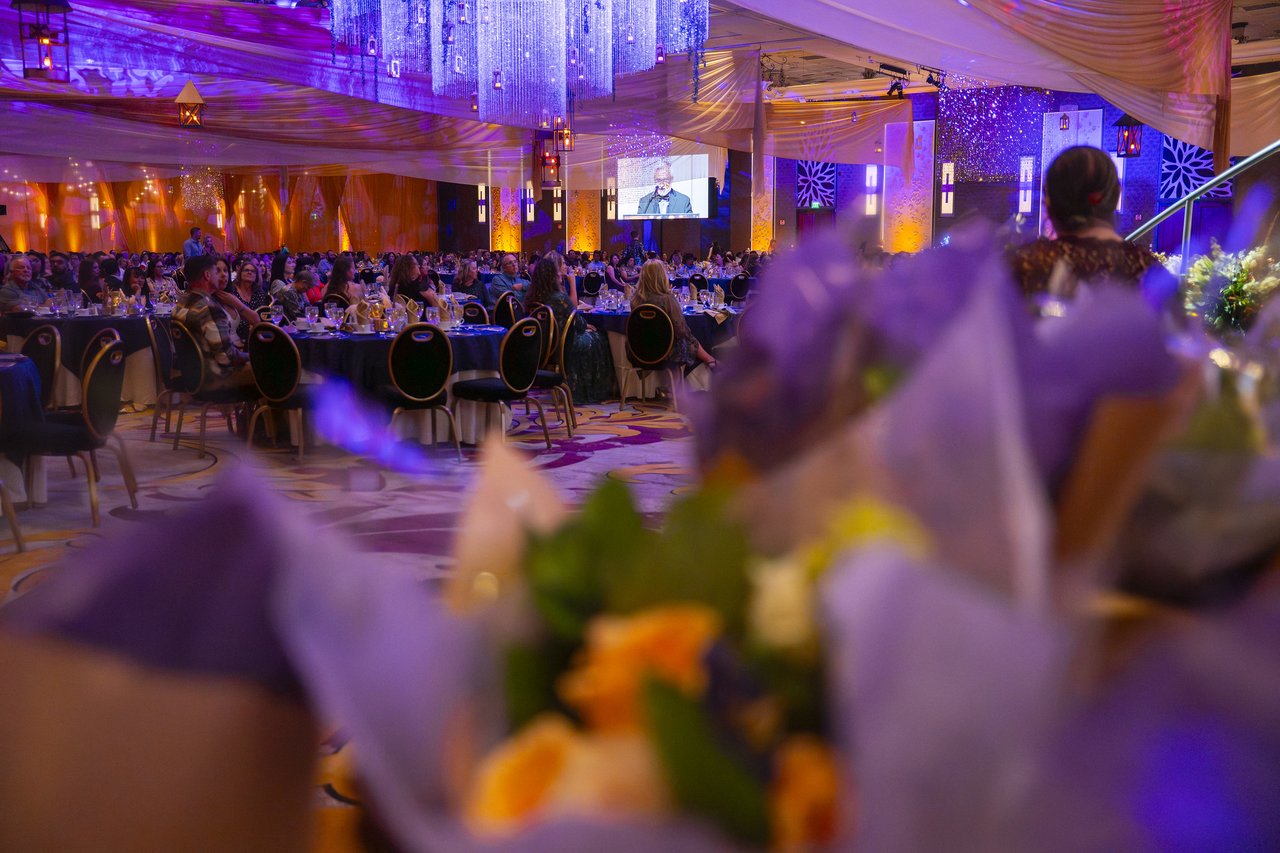Bouquets waiting for the honorees with the ballroom behind them