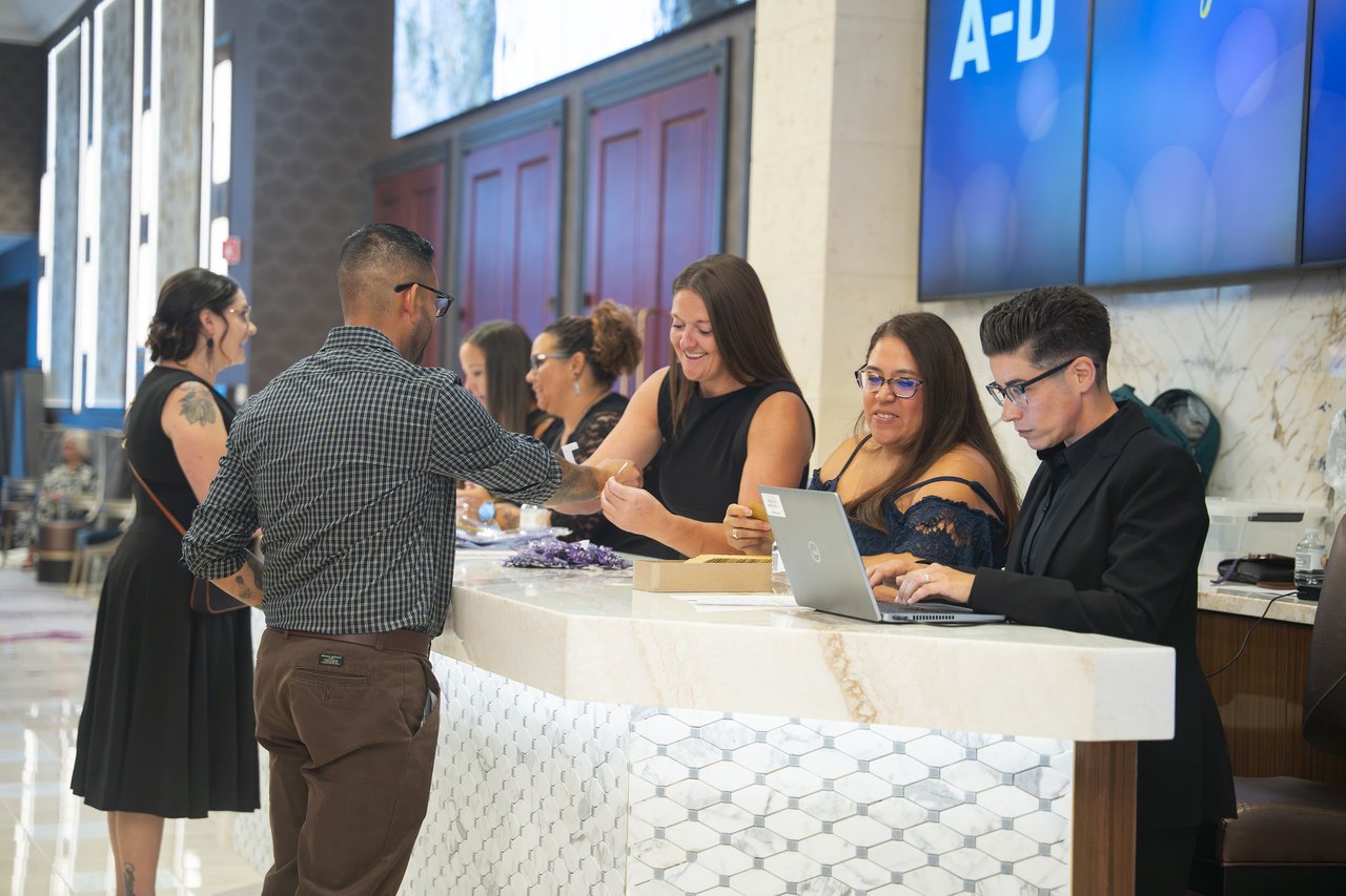 Renown guests checking in at the welcome table