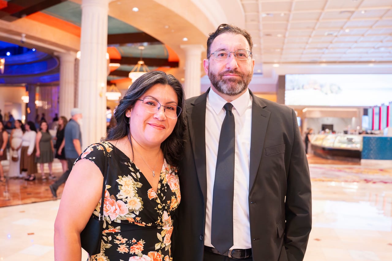 A Renown couple posing in the Peppermill lobby on the way in