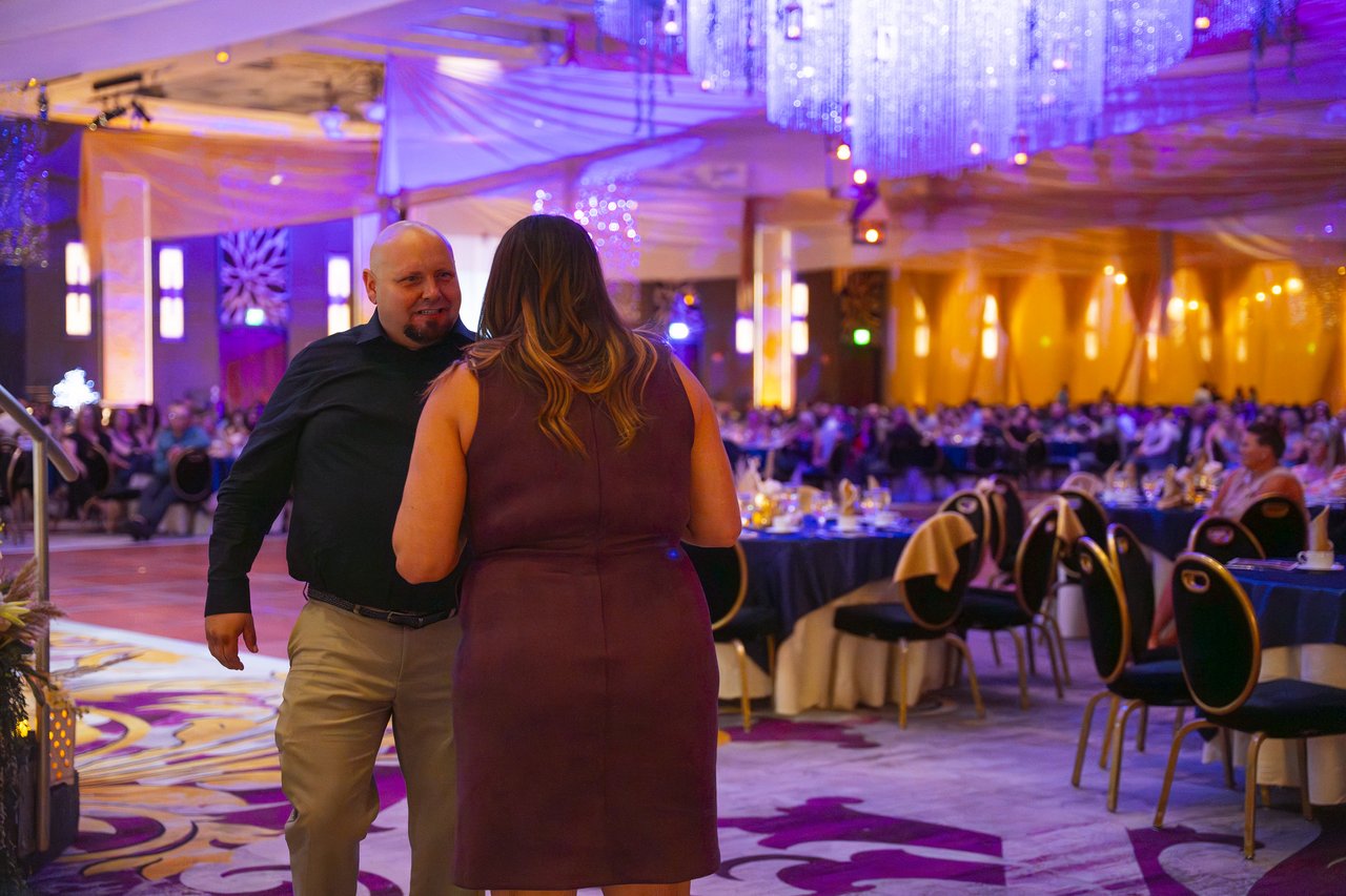 Two Renown coworkers heading out to the dance floor