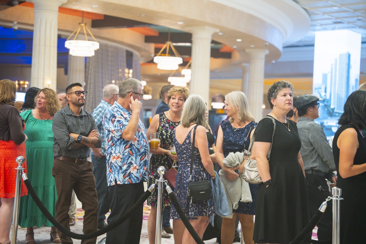 Renown guests arriving and mingling in the lobby