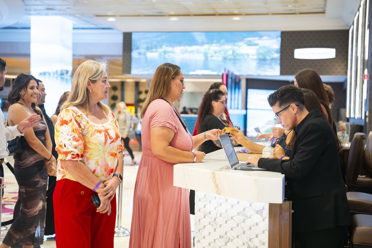 Renown guests checking in at the welcome desk