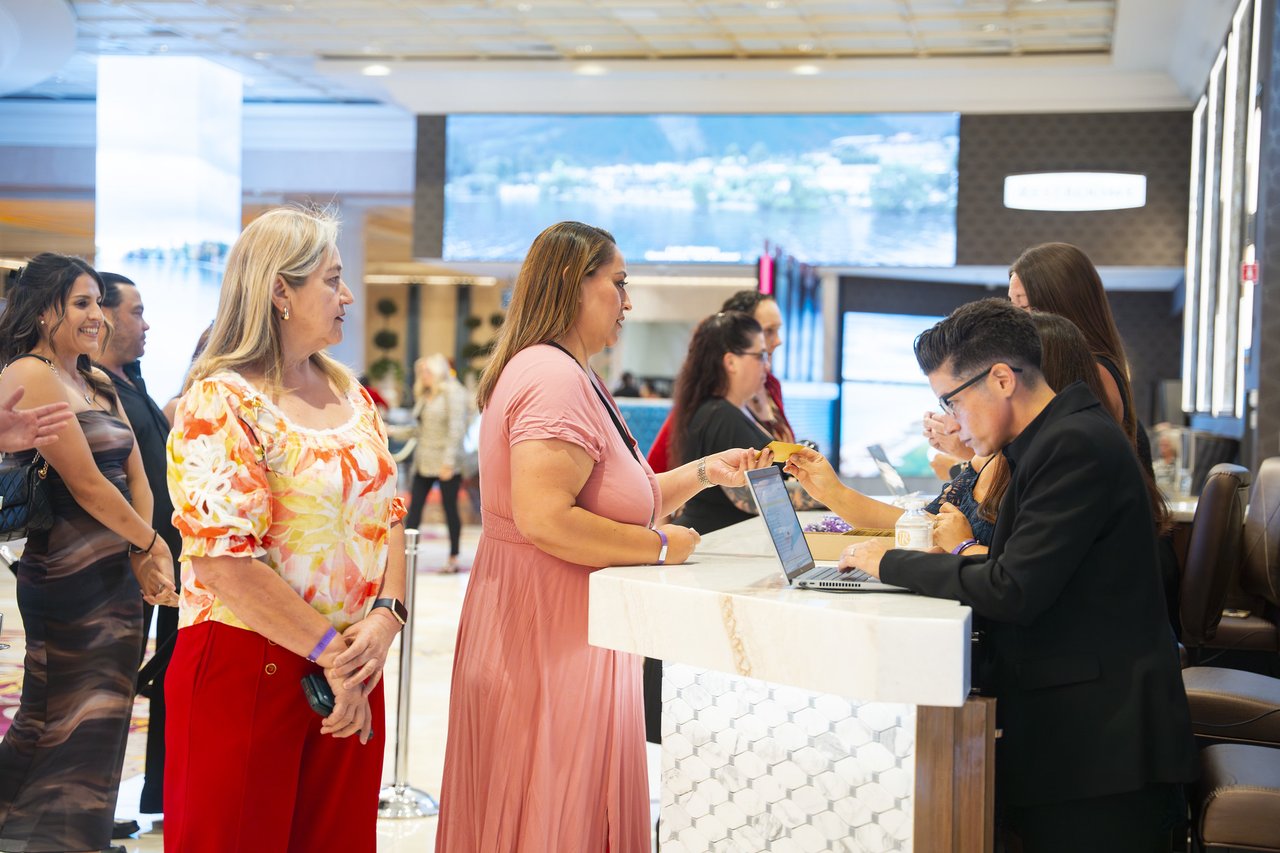 Renown guests checking in at the lobby desk