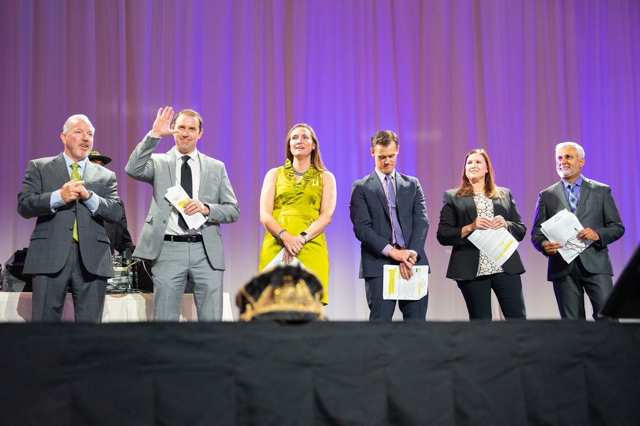 Renown honorees smiling and waving from the stage