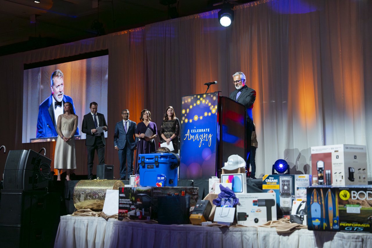 The raffle prize table under the podium during the speeches