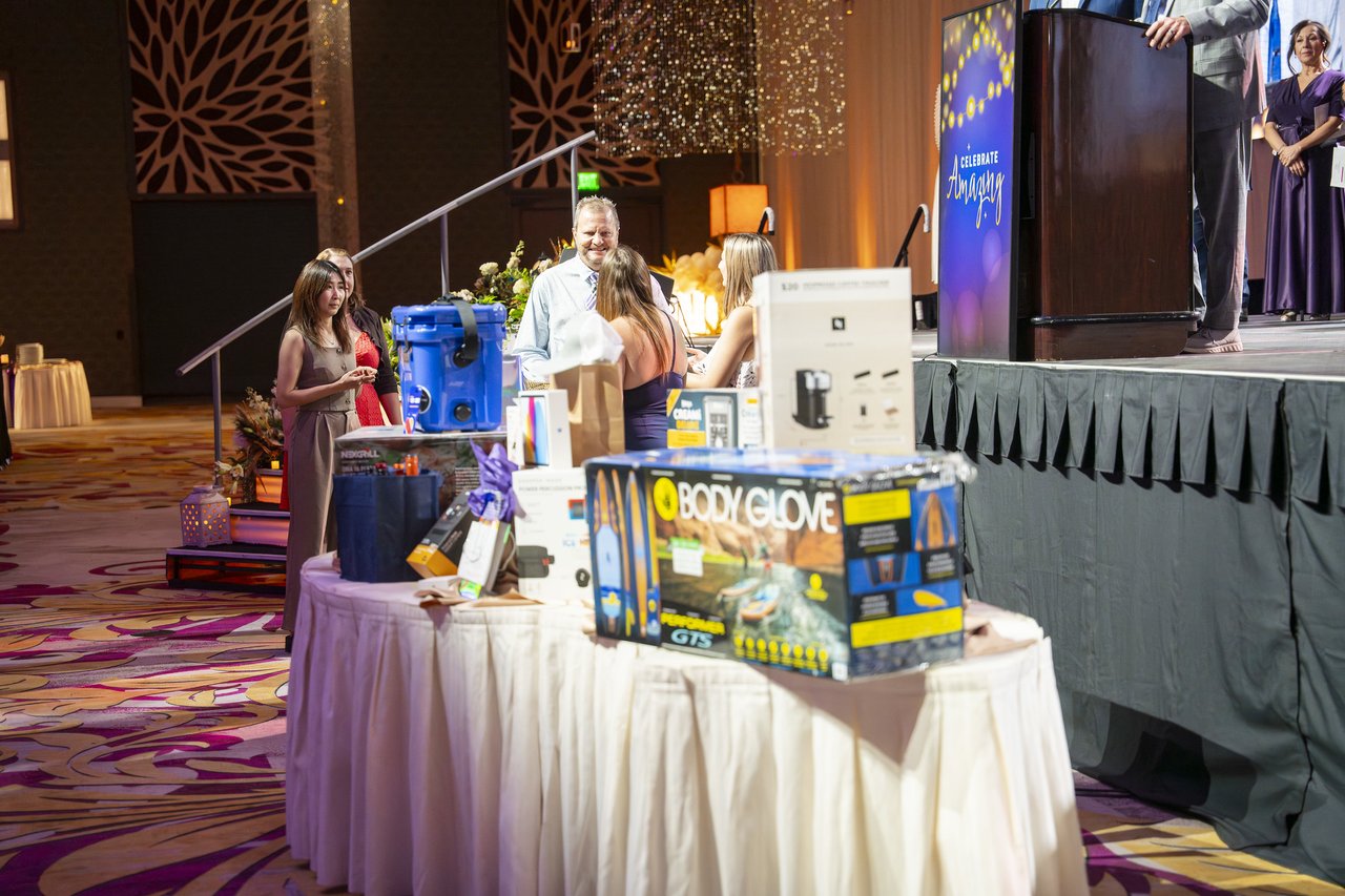 The raffle prize table beside the stage
