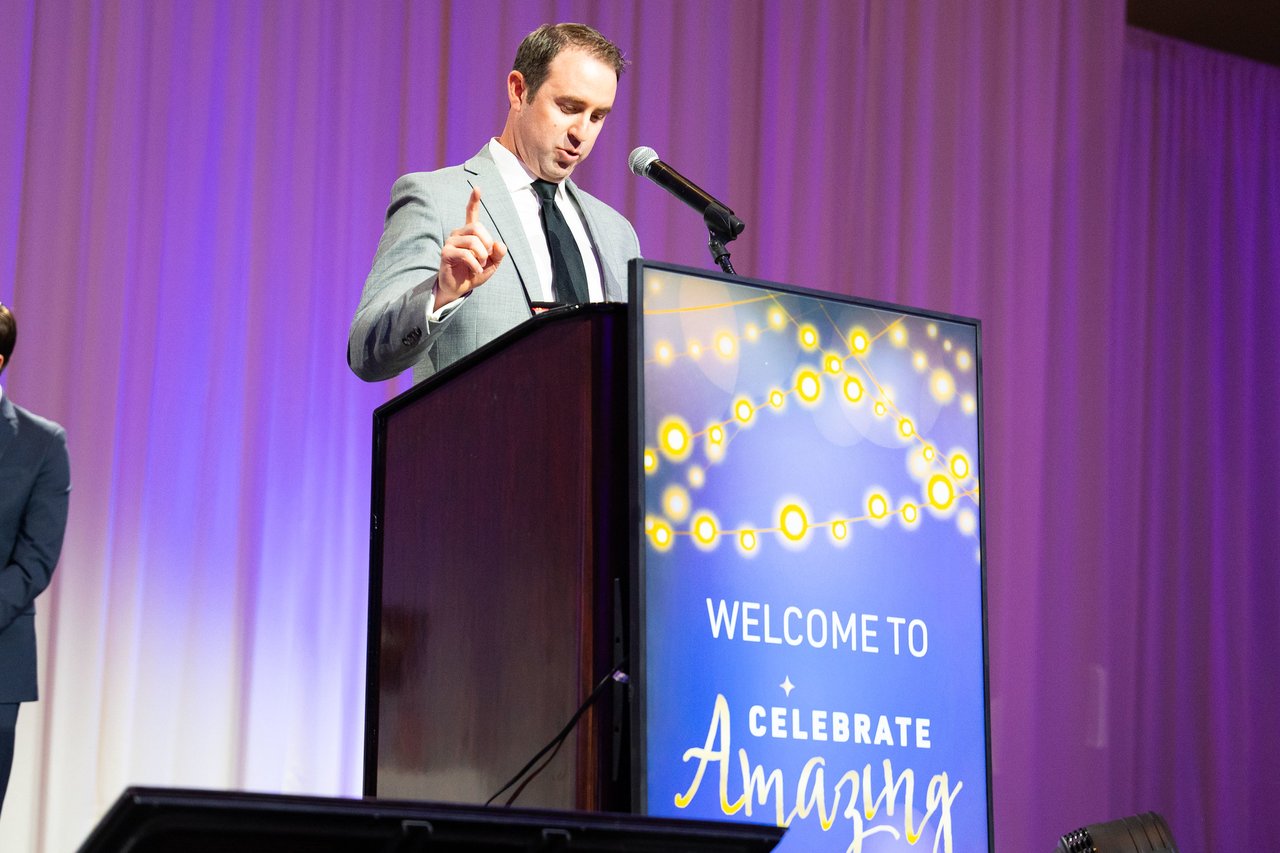 A Renown speaker making a point at the Celebrate Amazing podium