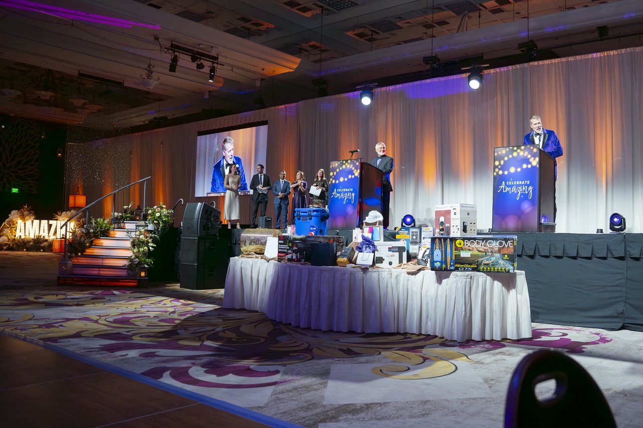 The stage and raffle prizes seen from the ballroom floor