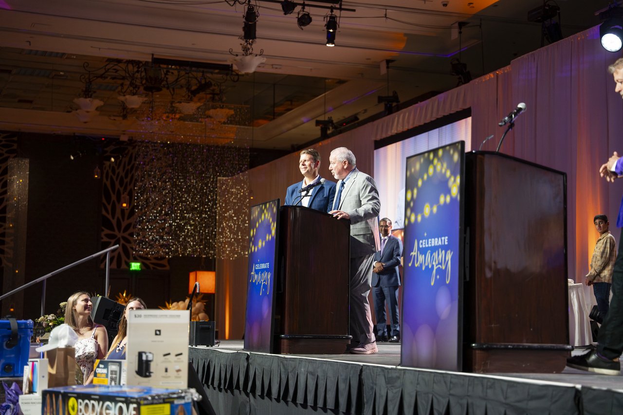 Two Renown leaders sharing the podium