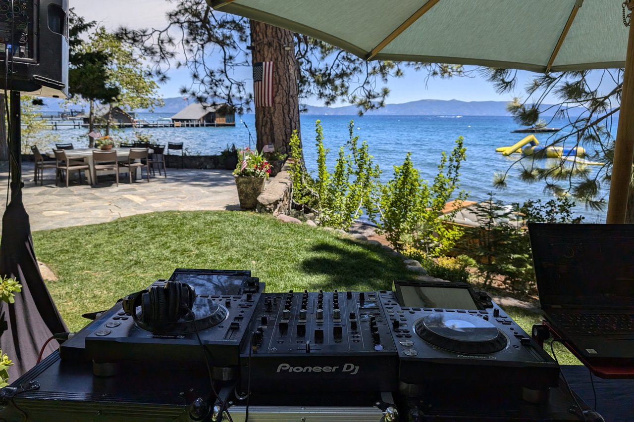 Pioneer DJ decks on the lawn facing Lake Tahoe