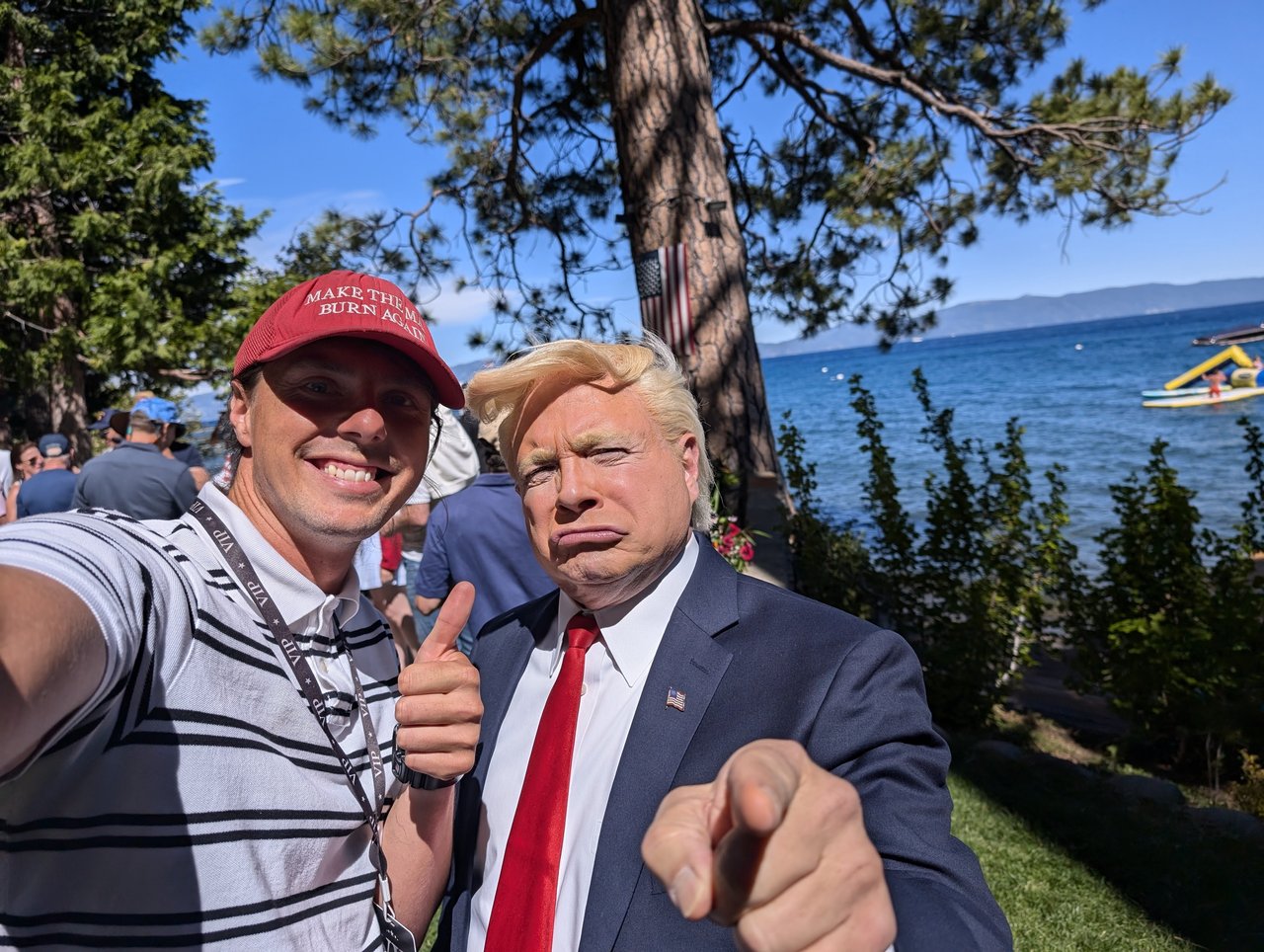 Me with Trump impersonator John Di Domenico, thumbs up by Lake Tahoe