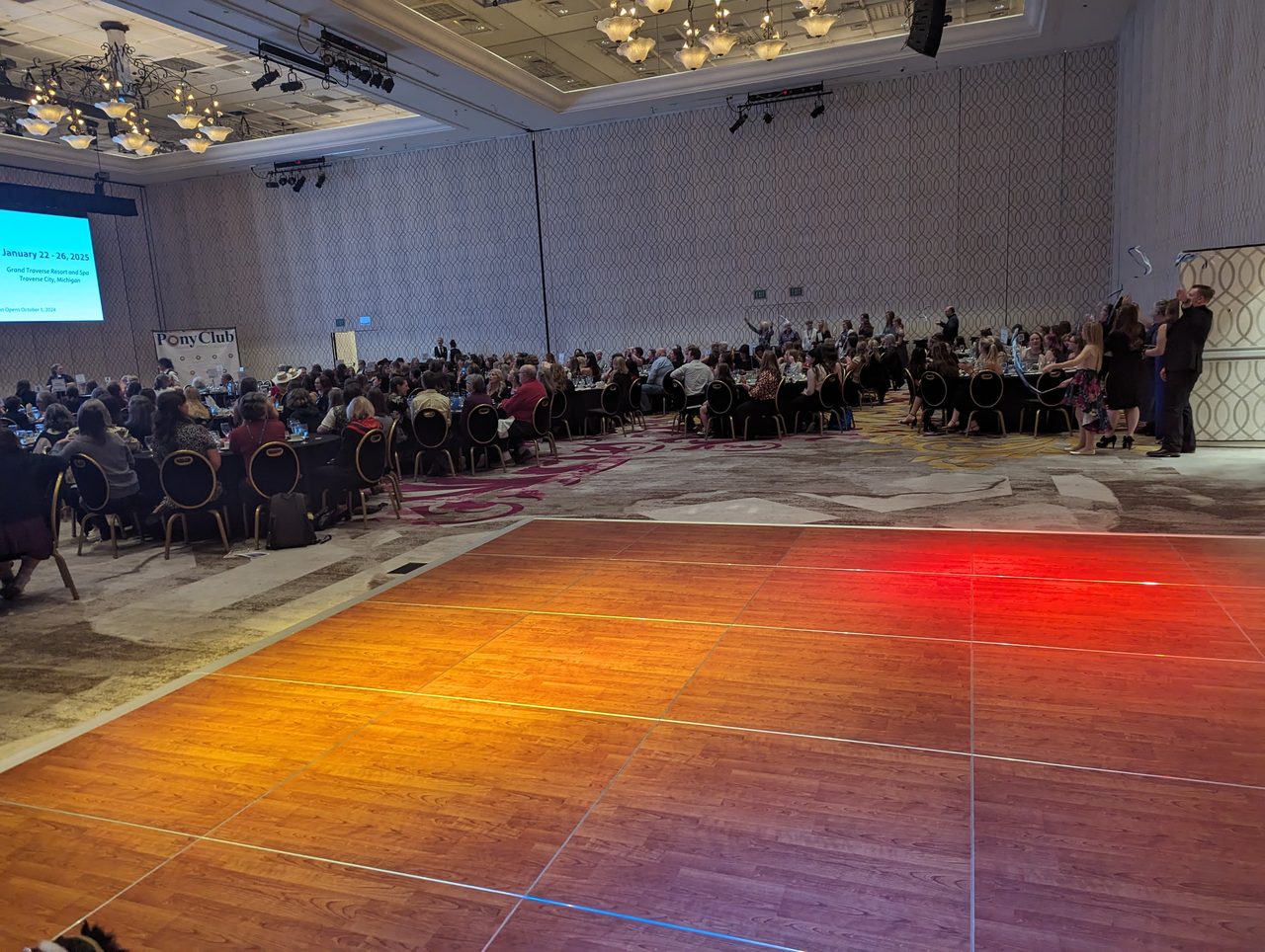 The full banquet room at the Peppermill during the awards program, the dance floor still empty