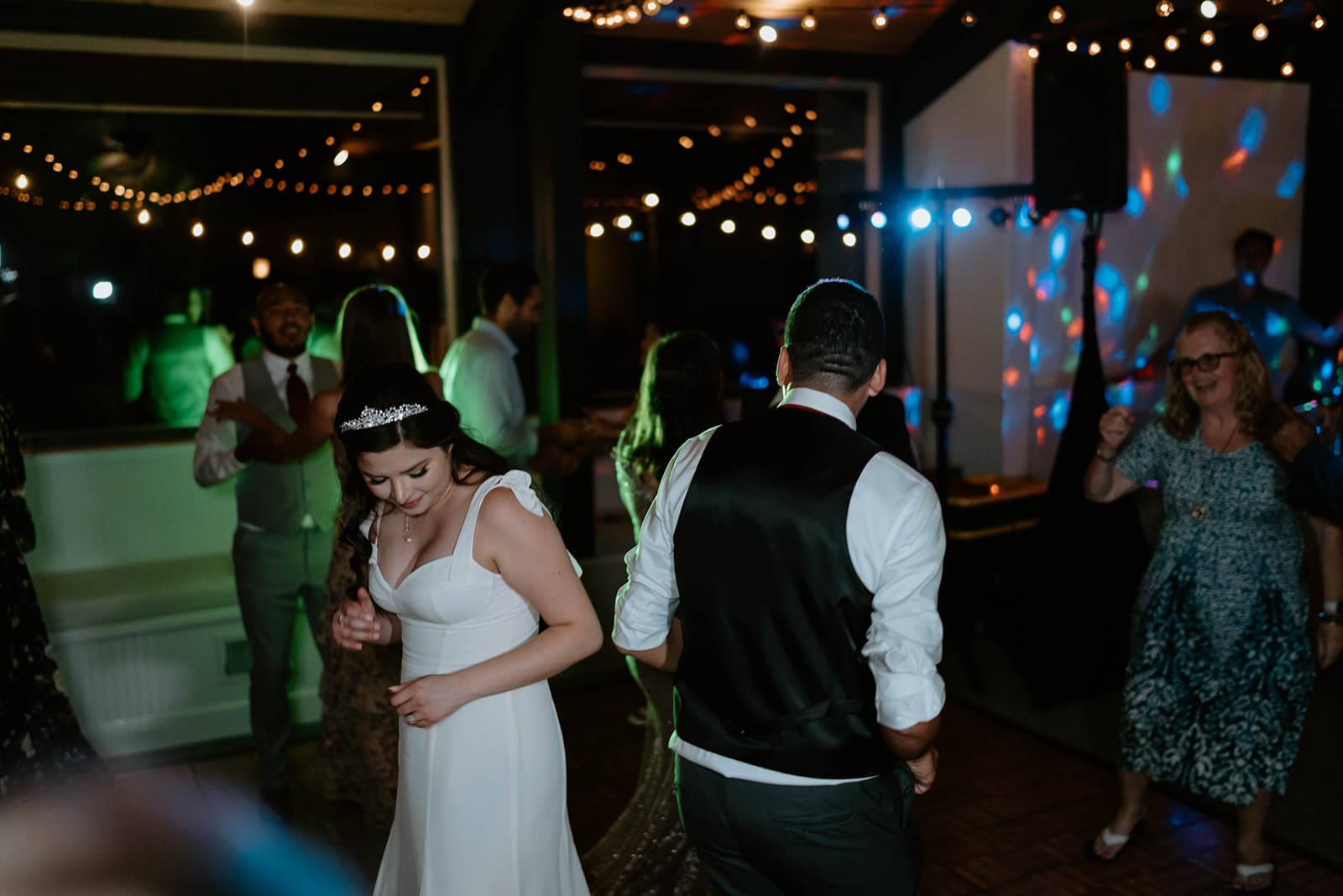 Bride and groom dancing on the dance floor with professional DJ lighting at Reno wedding - DJs In Reno