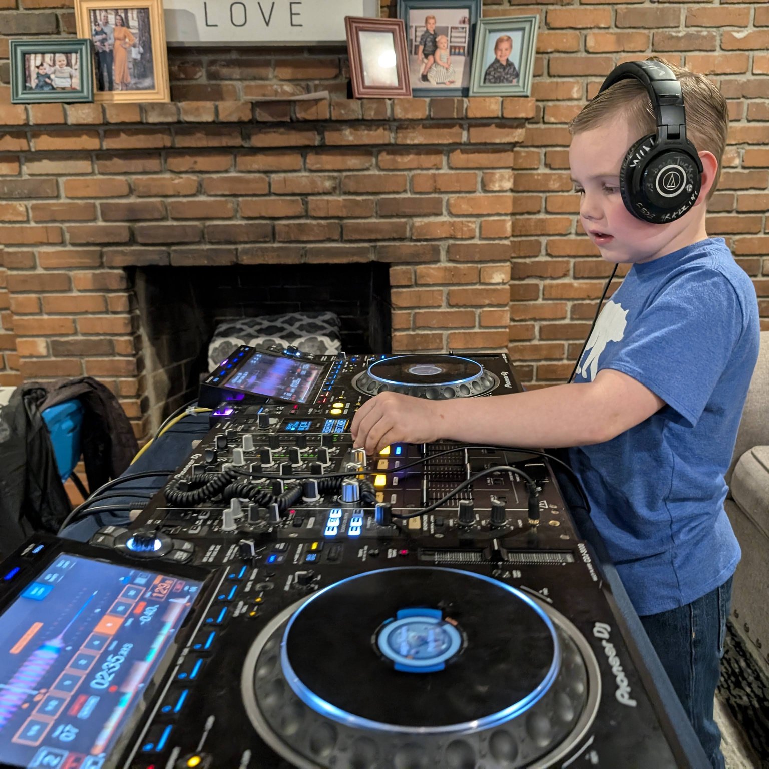 A student learning to mix on DJ equipment during a DJ lesson in Reno.