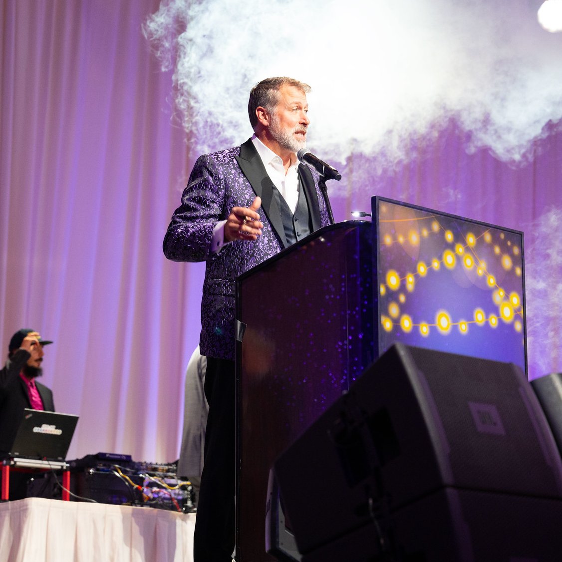 A large corporate event in the Peppermill Tuscany Ballroom with professional Reno DJ lighting and sound.