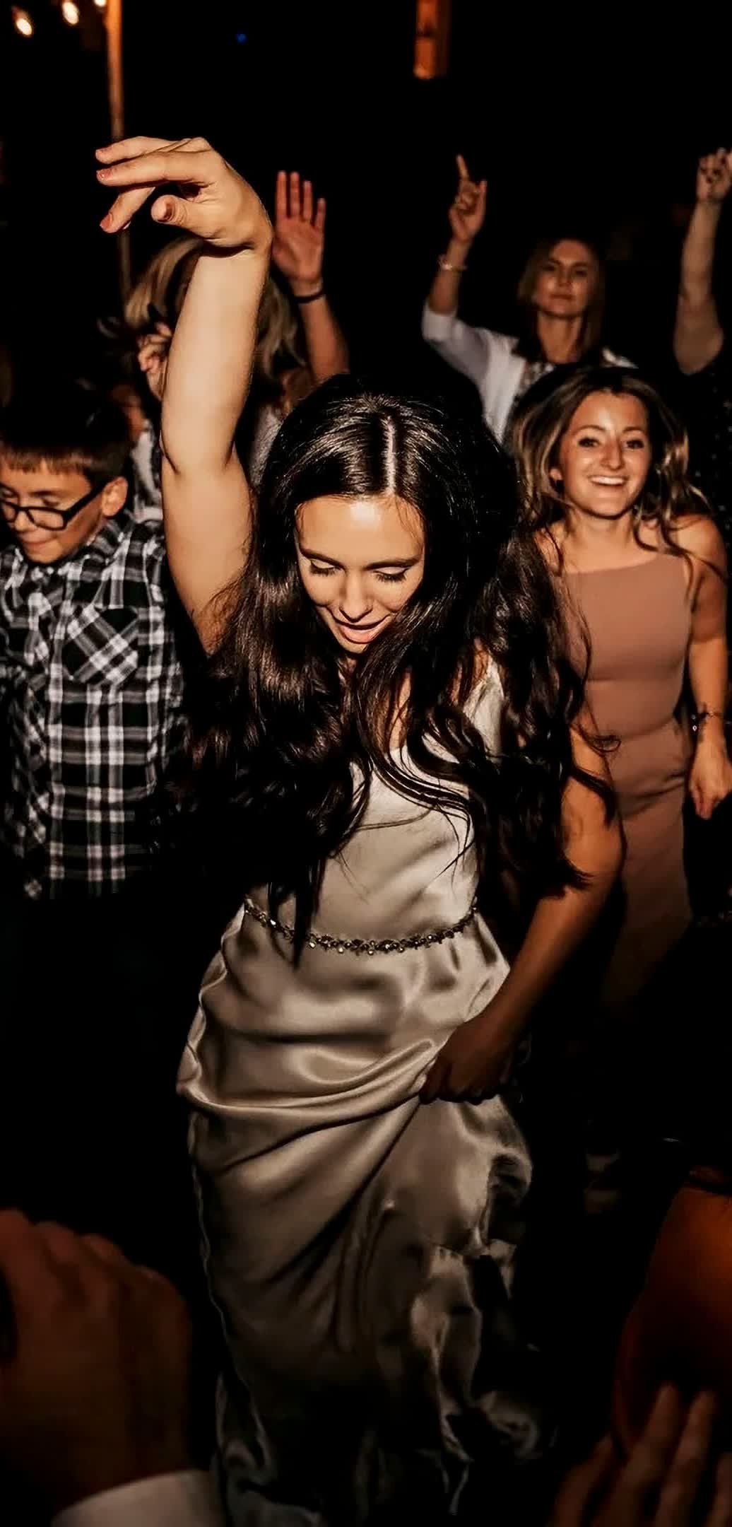 A packed dance floor at Lindsey and Nathaniel's wedding reception, DJ'd by DJs In Reno at Twenty Mile House in Graeagle, California.
