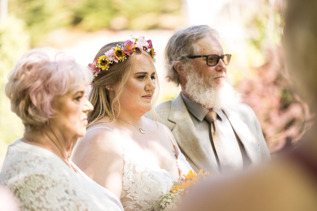A close view of Abney with the two family members who walked her down the aisle