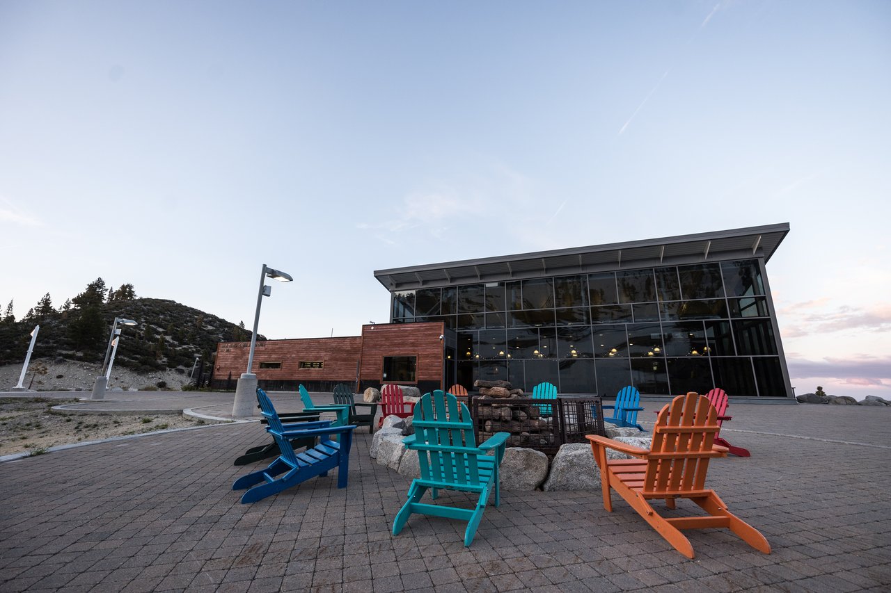 Colorful Adirondack chairs outside the lodge