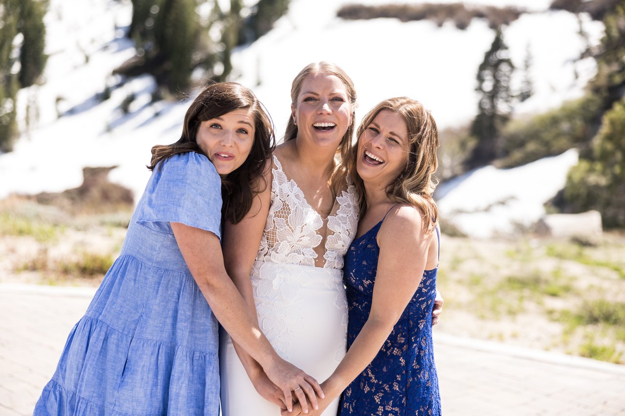 Ali laughs with two of her girlfriends
