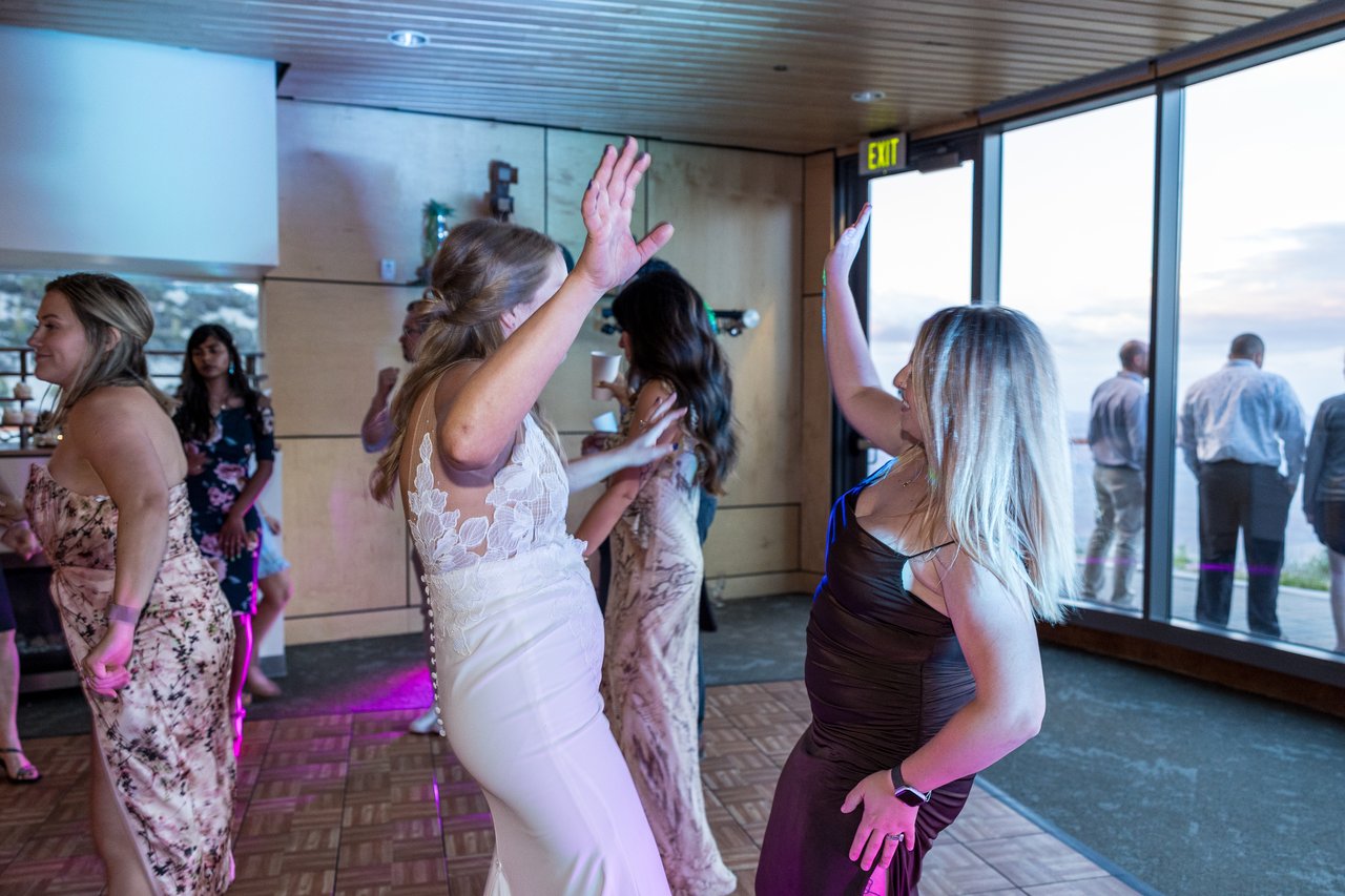 Ali dancing with her arms up