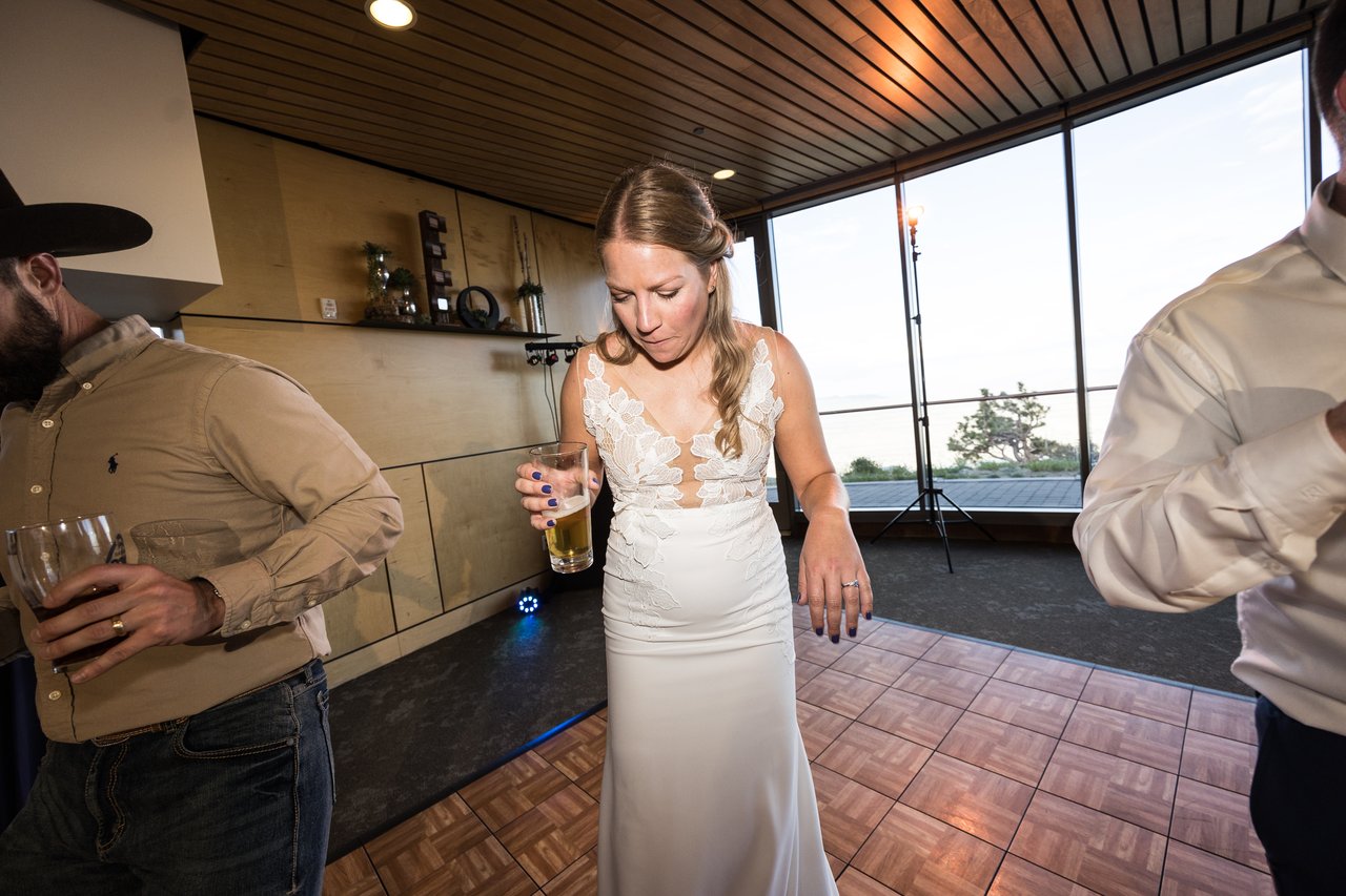 Ali with a beer on the dance floor