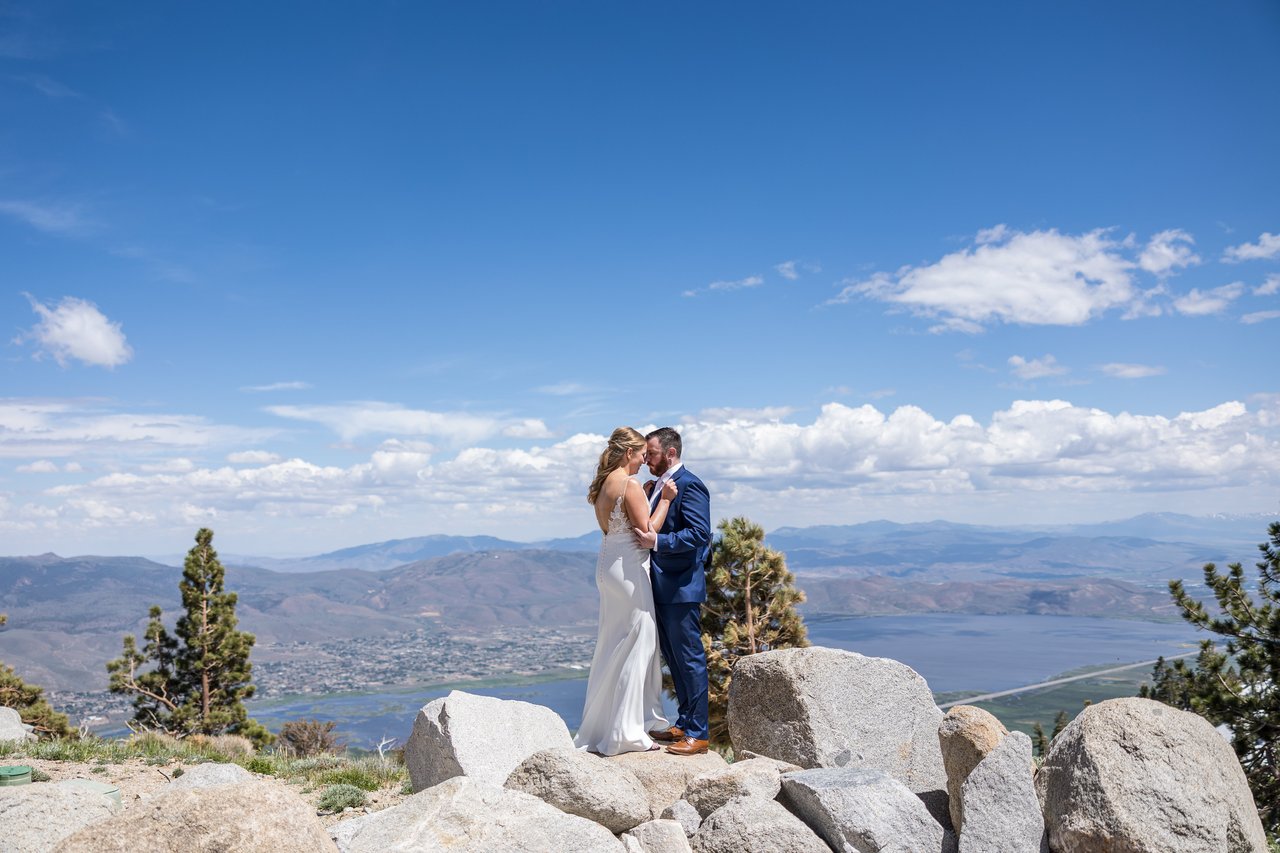 Ali and Robert on the boulders with Washoe Lake far below