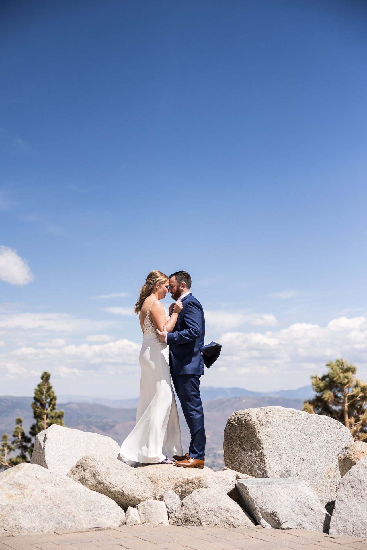 Ali and Robert on the rocks under a huge sky