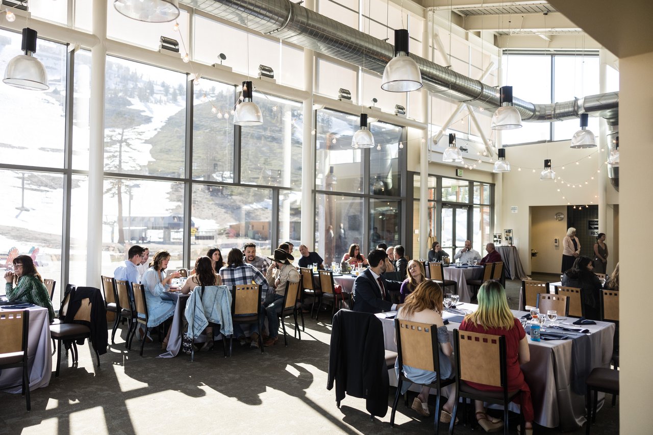 Dinner in the hall with the ski hill through the windows