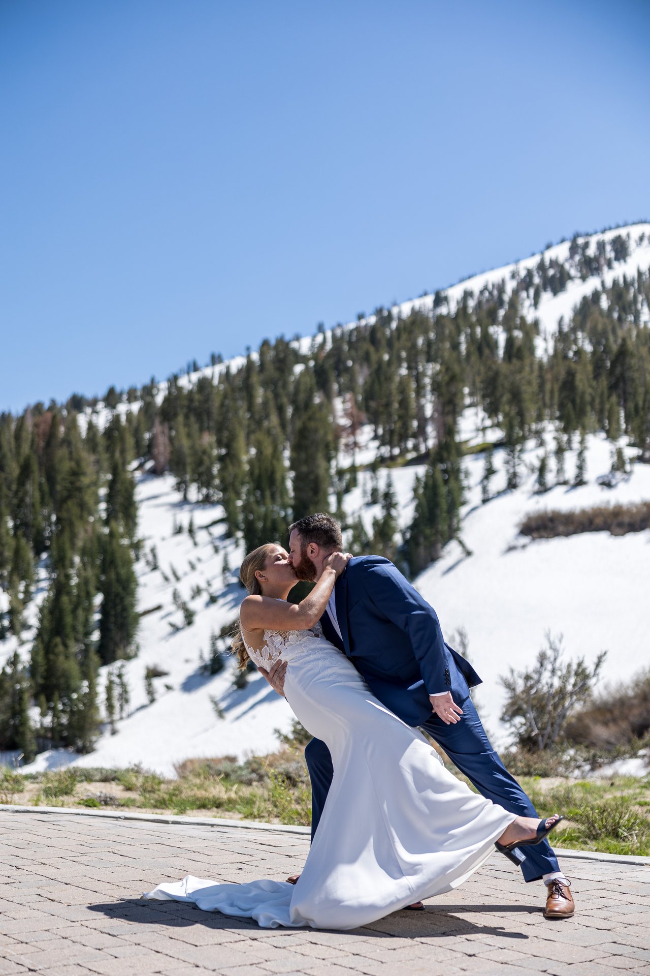 A dip kiss with Mt Rose in the background