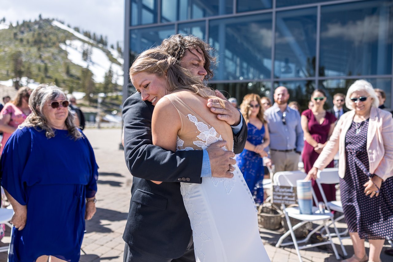 Ali hugs her escort at the front