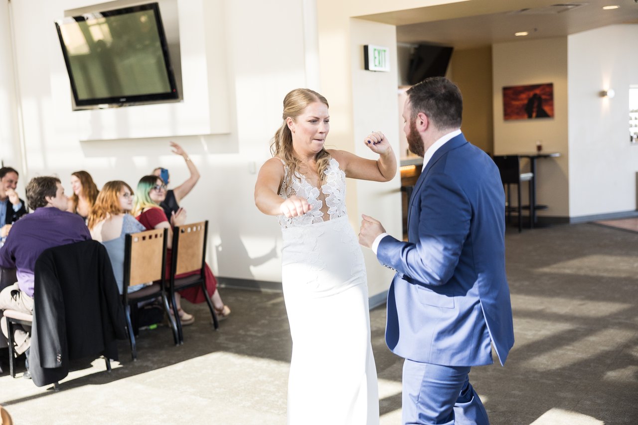 Ali and Robert cheering as they come in