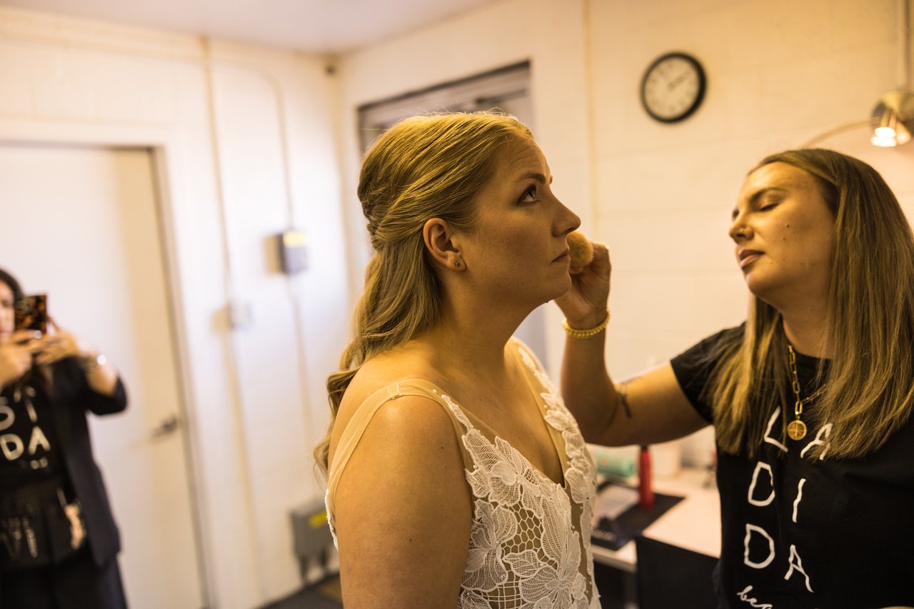 Final touches on Ali's makeup