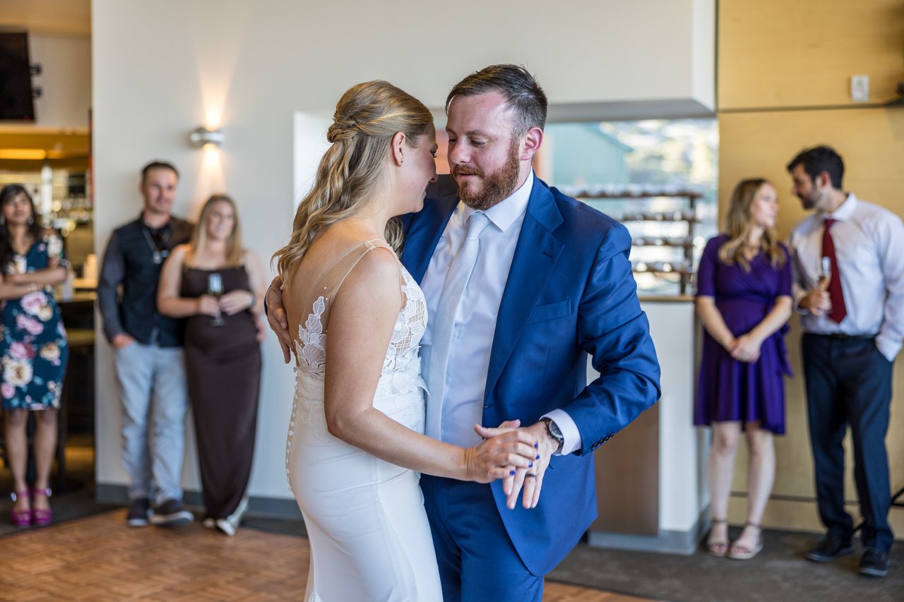 Ali and Robert cheek to cheek during their first dance