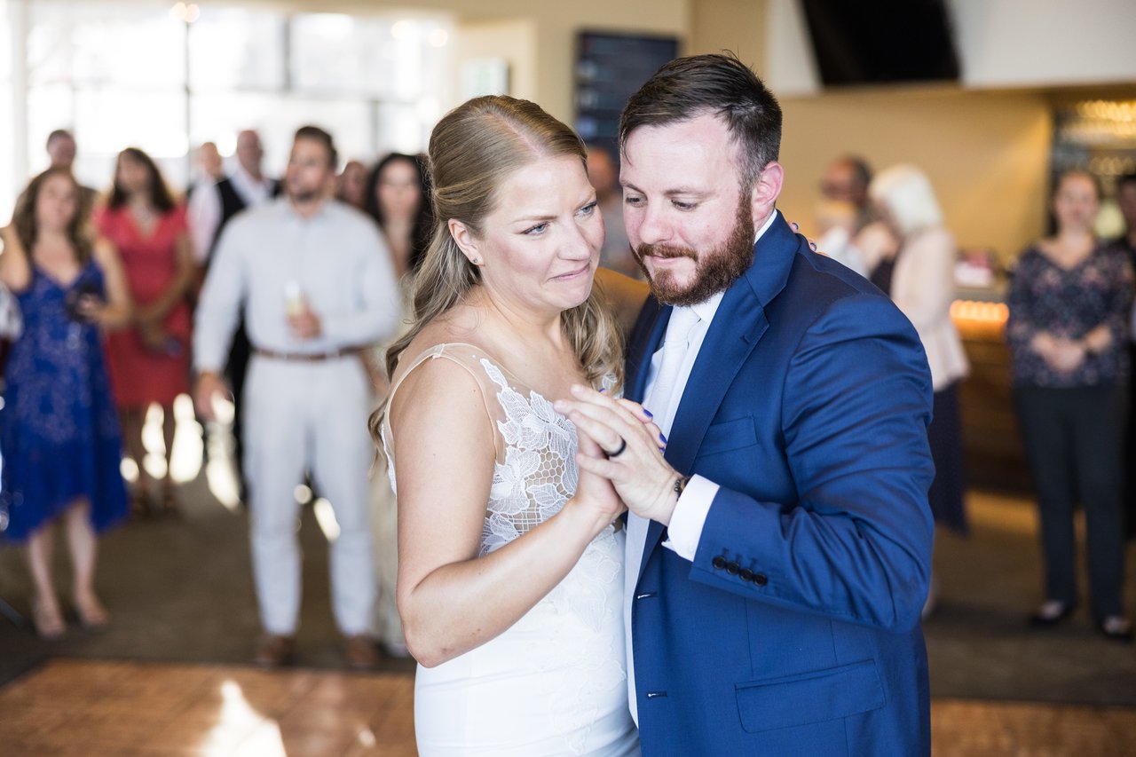 Ali and Robert dance as guests watch