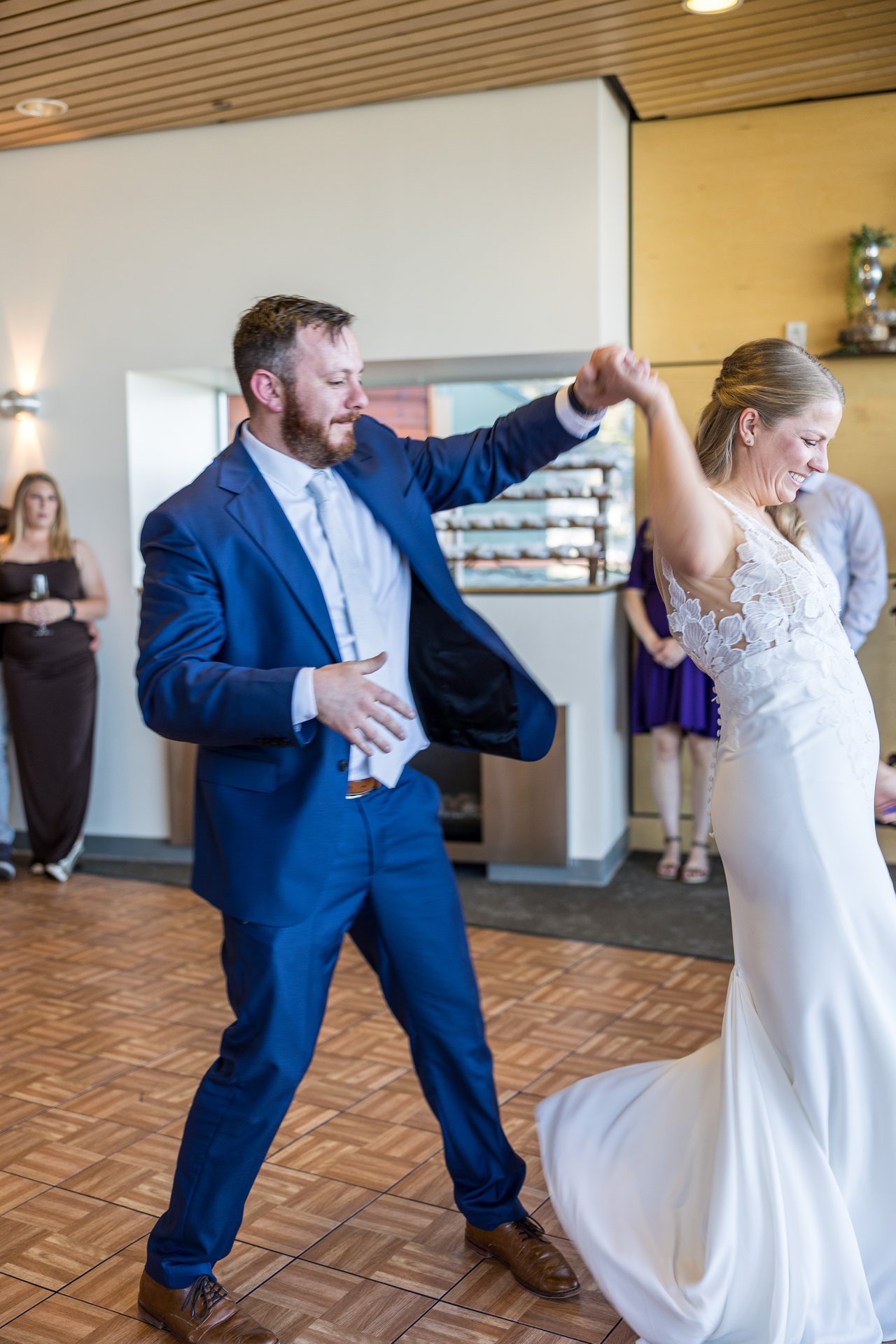 Robert twirls Ali during the first dance