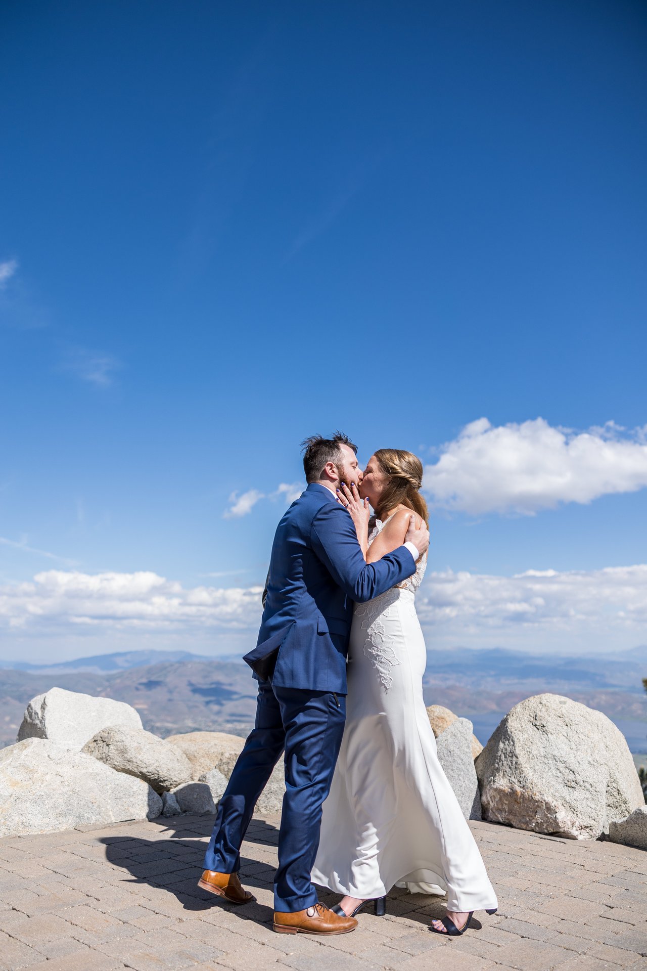 Their first kiss under a huge blue sky